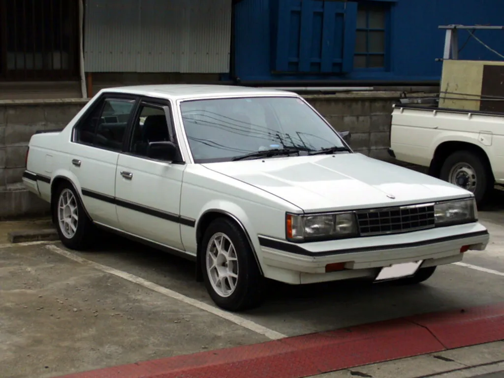 Toyota Corona рестайлинг 1983, седан, 7 поколение, T140 (10.1983 - 12.1987)